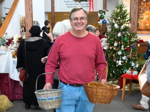 A volunteer at the bazaar