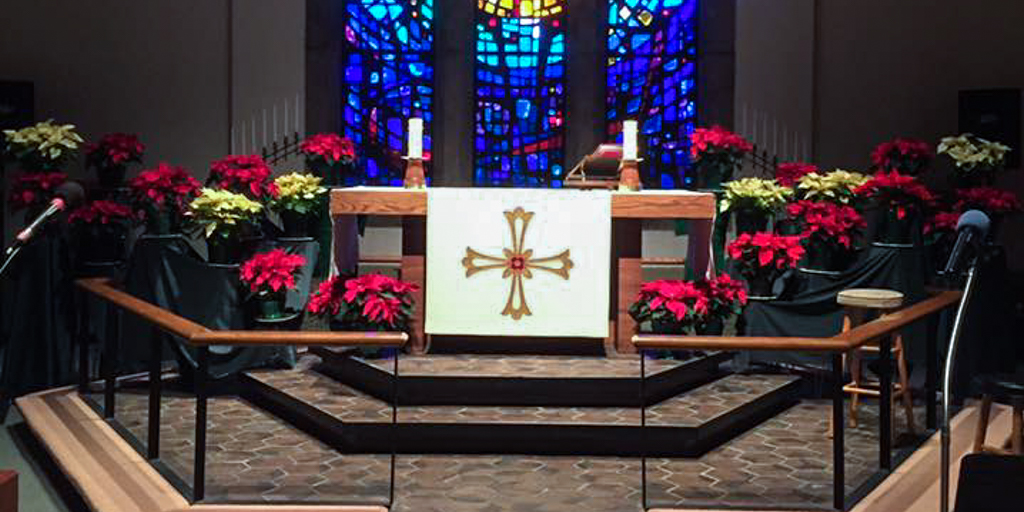 Poinsettias at the altar