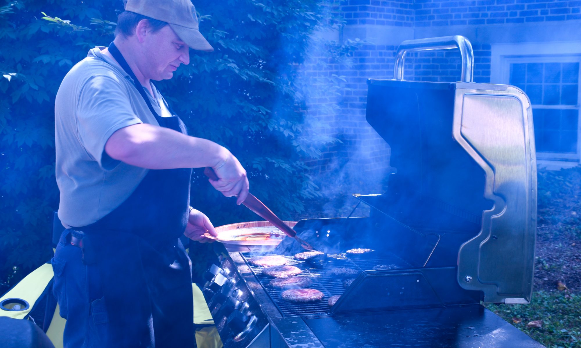 The grillmaster at work during the 2018 picnic.