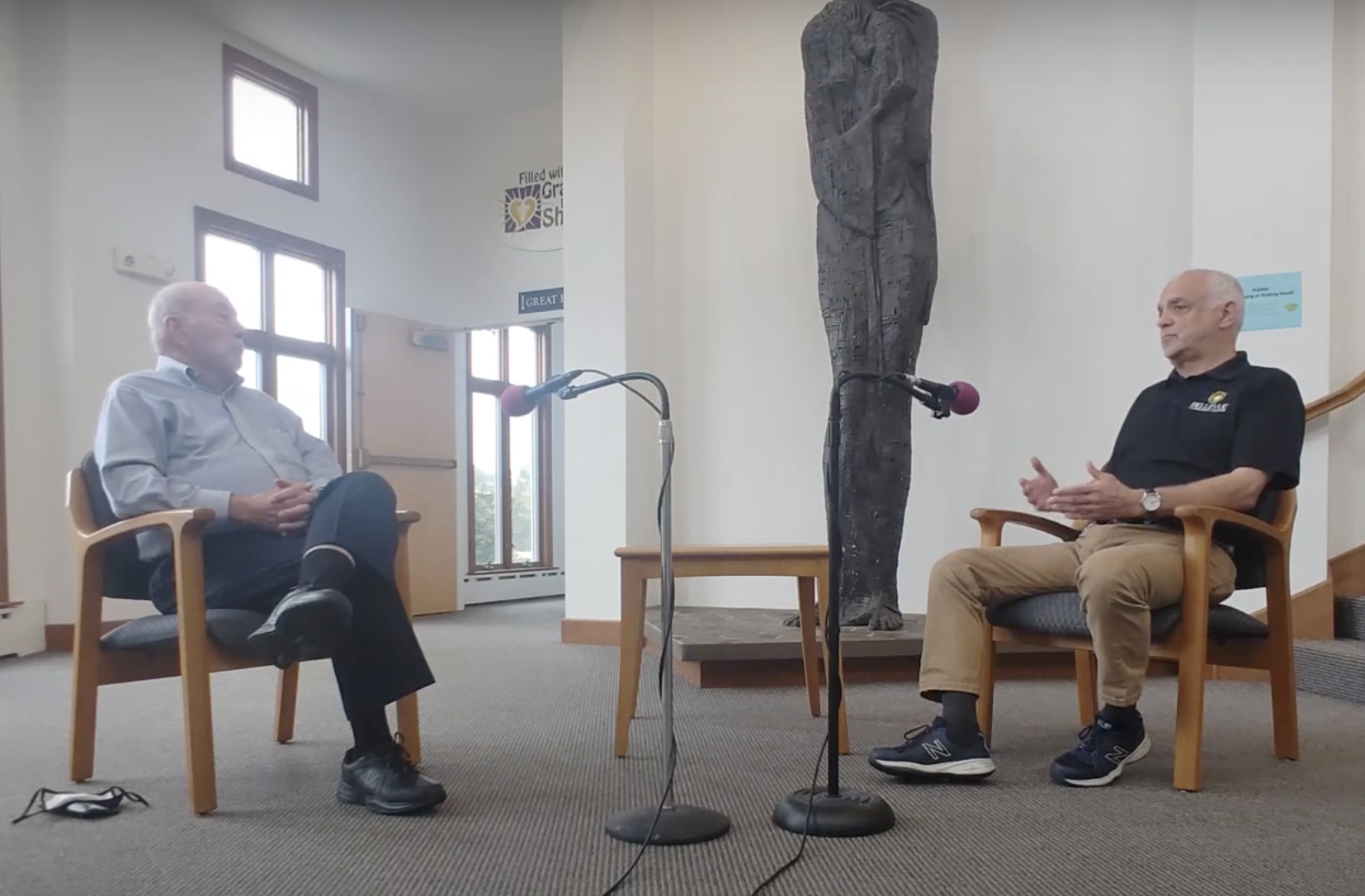 Interim Pastor David Mueller and Joseph Wisniewski, executive director of the Bellevue Community Center