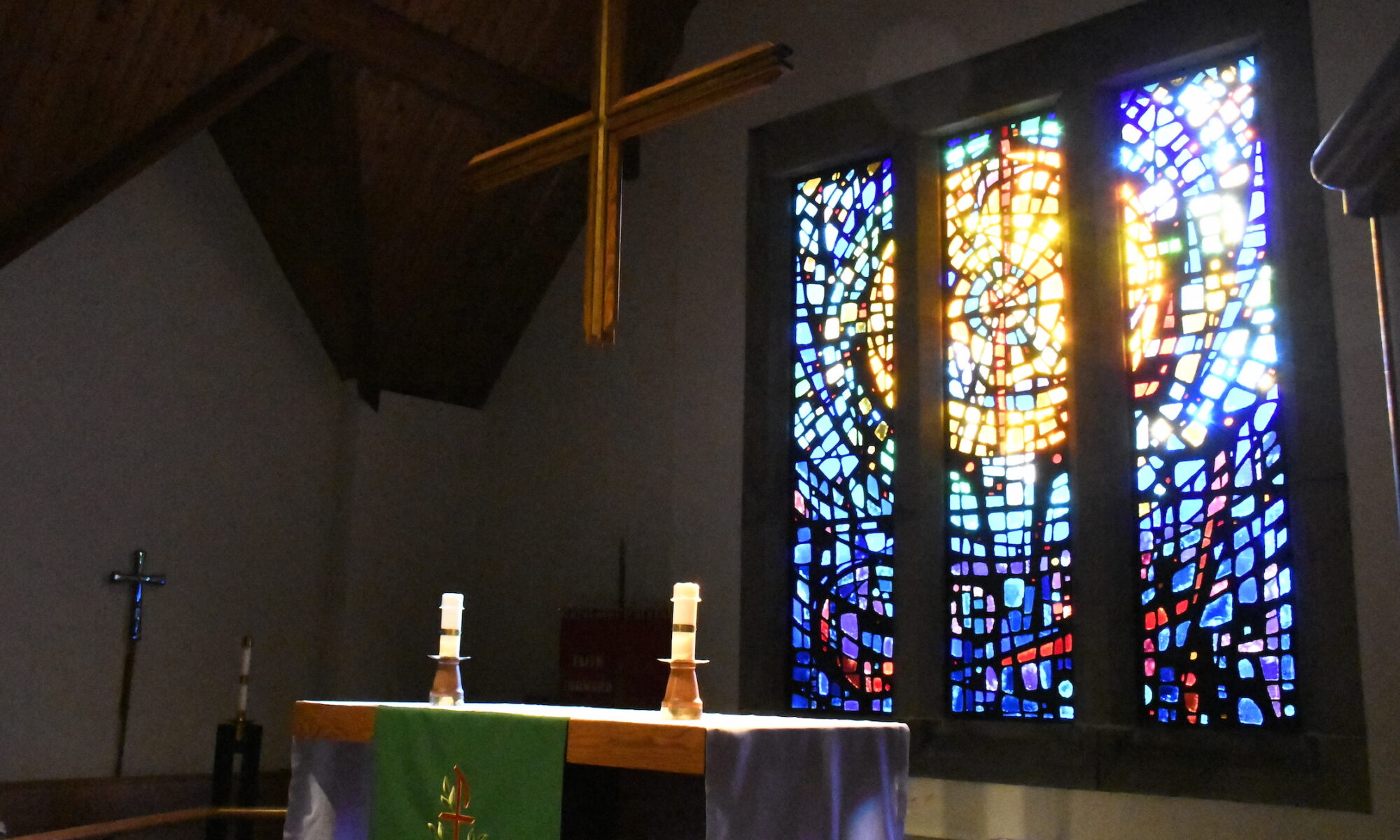The altar, cross and window